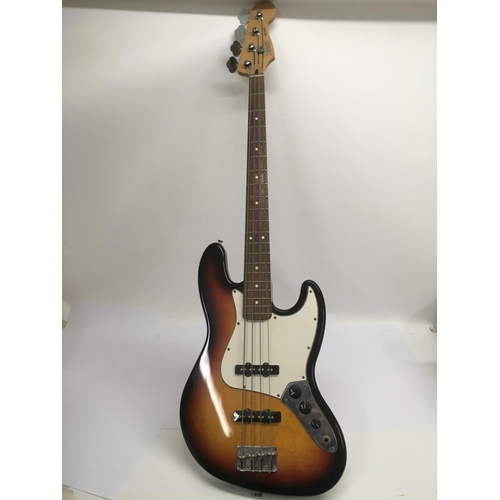 708 - A Mexican Fender Jazz bass guitar in classic sunburst finish, serial number MZ2025644. No case.