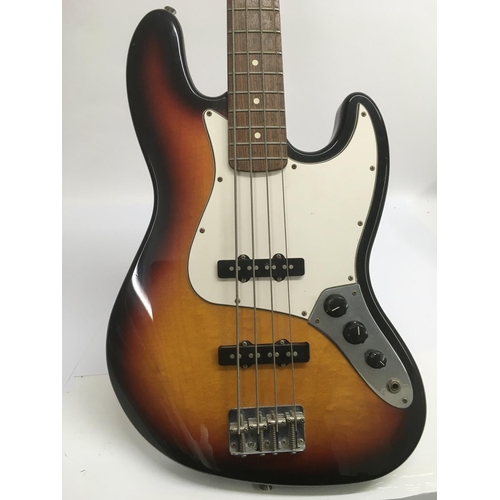 708 - A Mexican Fender Jazz bass guitar in classic sunburst finish, serial number MZ2025644. No case.