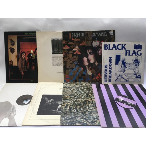 71 - A collection in two bags of twenty six punk and new wave LPs and 12inch singles by various artists i... 