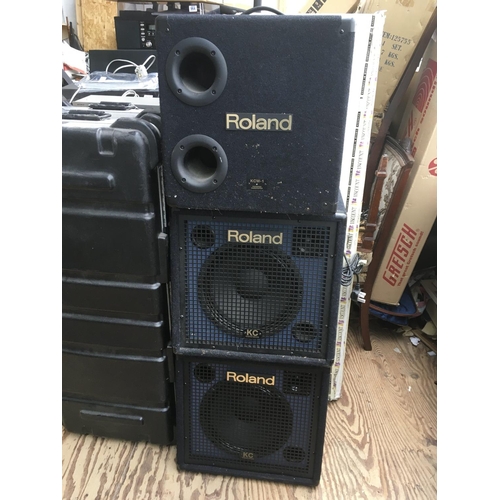 718 - Two Roland KC350 keyboard wedge amplifiers together with a Roland KCW1 subwoofer (3).