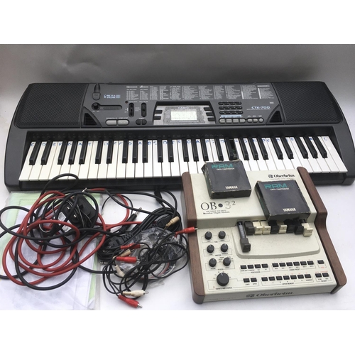 721 - An Oberheim OB3 squared drawbar organ module, a Casio CTK 700 (missing one key) and various leads an... 