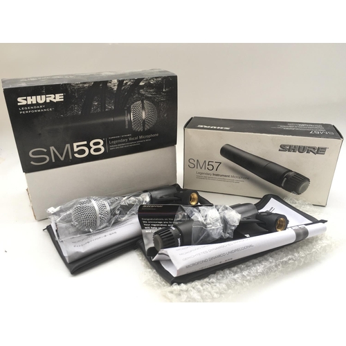 723 - Two boxed Shure microphones comprising an SM58 and an SM57.