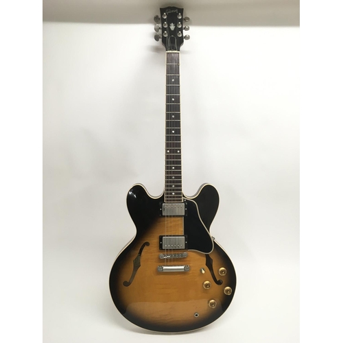 727 - A 1997 Gibson ES335 electric guitar, serial number 92387371. Guitar is in a very good condition and ... 