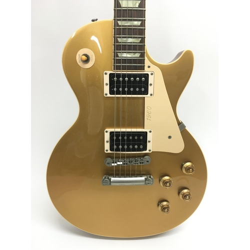 728 - A Gibson Les Paul '1960 Classic' electric guitar, with a gold top finish, serial number 80928. Guita... 