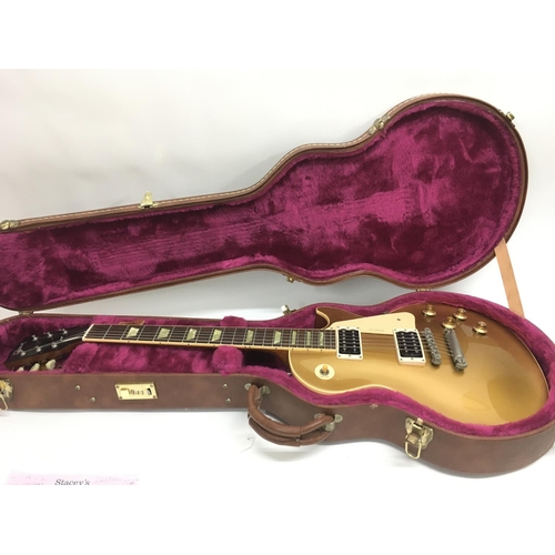 728 - A Gibson Les Paul '1960 Classic' electric guitar, with a gold top finish, serial number 80928. Guita... 