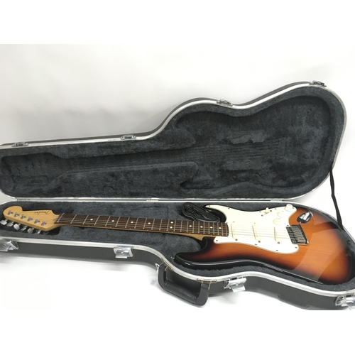 730 - A 1995-96 USA Fender Stratocaster electric guitar in classic three tone sunburst finish, serial numb... 