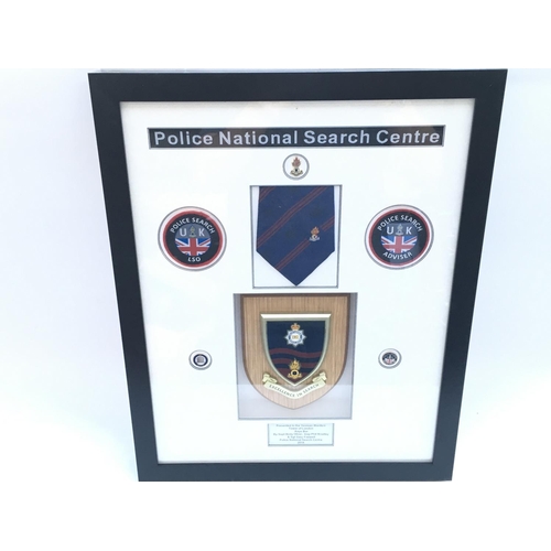 3204 - Framed Police National Search Centre presentation given to Yeoman Warders.
Provided with letter of A... 