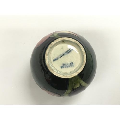 1000 - A small Moorcroft Orchid vase, approx 7cm.