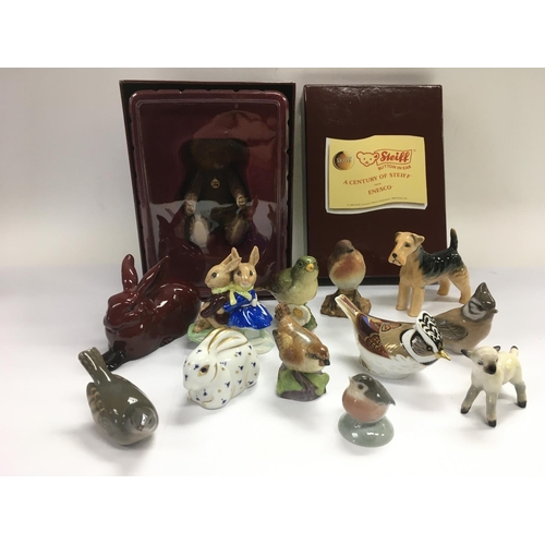 1002 - A collection of ceramic animal figures comprising examples by Beswick, Royal Copenhagen, a flambe Ro... 