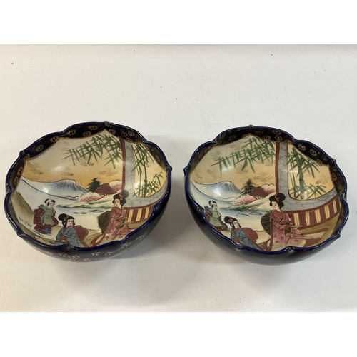 1132 - A pair of 20th century satsuma bowls.
