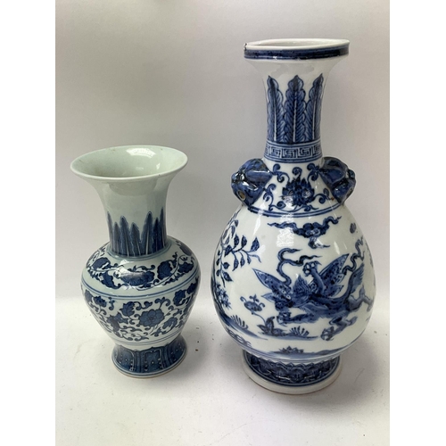 1137 - Two Chinese reproduction vases, one measuring in height approximately 11.5inches, the other measurin... 