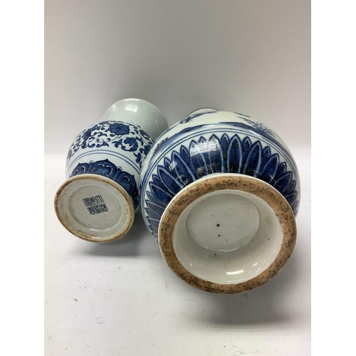 1137 - Two Chinese reproduction vases, one measuring in height approximately 11.5inches, the other measurin... 