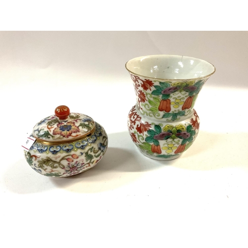 1146 - A small Chinese porcelain famille rose decorated pot and cover together with a small wide rimmed pos... 