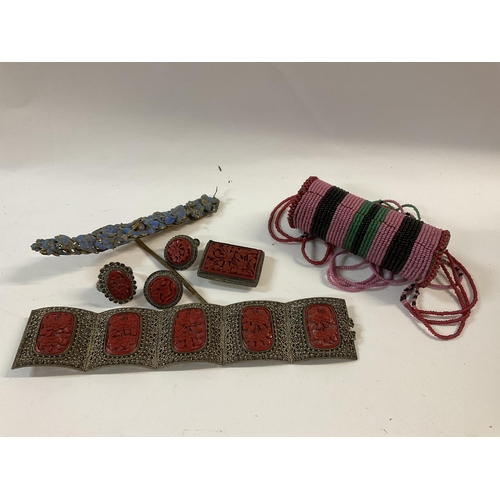 1148 - A Chinese carved cinnabar lacquer and filigree jewellery suite together with an enamelled hair pin a... 