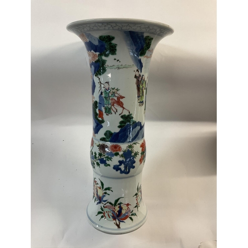 1151 - A large Chinese fluted vase with Famille verte design, 43cm.