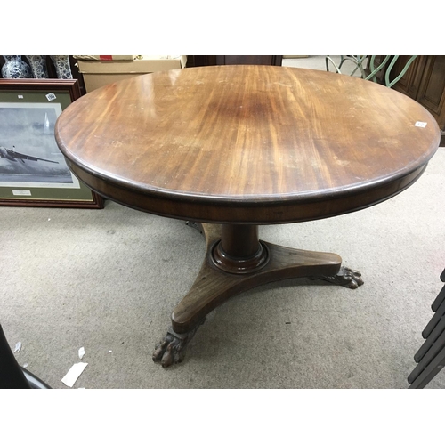 1209 - A Victorian dining table the circular top on a turned column and platform base diameter of top 110cm... 