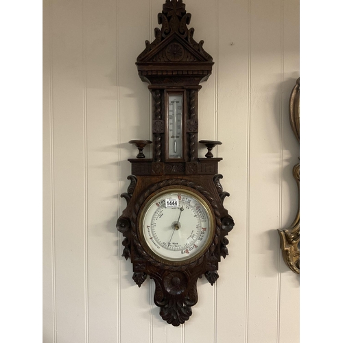 1224 - A Victorian carved oak barometer.