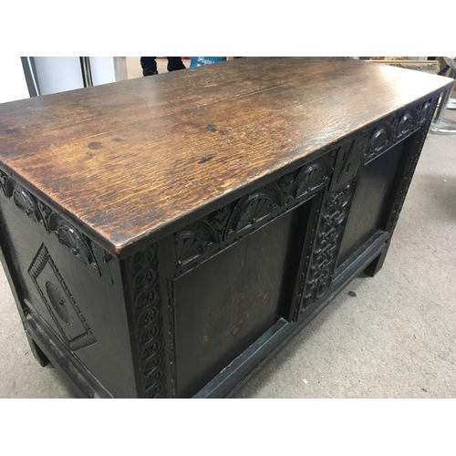 1225 - A late 17th or Early 18th Century chest coffer with a hinged top above inlaid and carved panels. Som... 