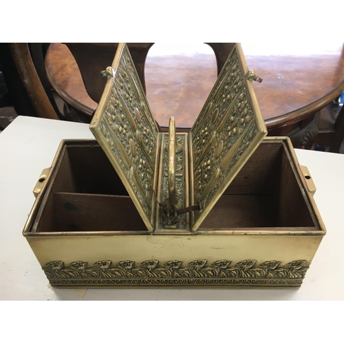 1240 - A good quality vintage brass box with a handle and two locking drawers, with embossed decoration. In... 