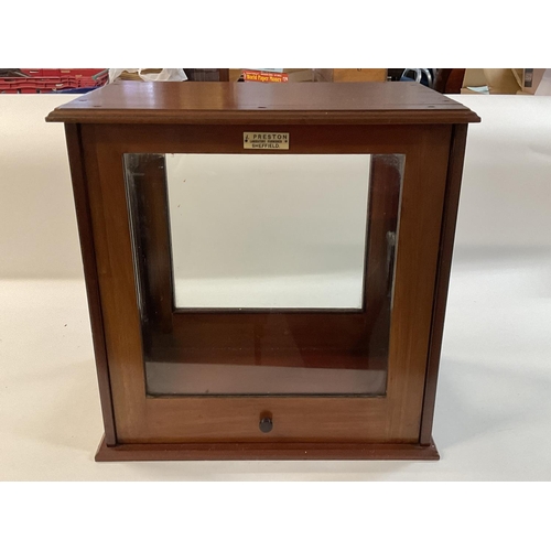 1251 - A Victorian pharmaceutical glass cabinet for scales with a sliding panel. Labelled J Preston, Labora... 
