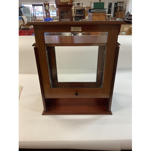 1251 - A Victorian pharmaceutical glass cabinet for scales with a sliding panel. Labelled J Preston, Labora... 