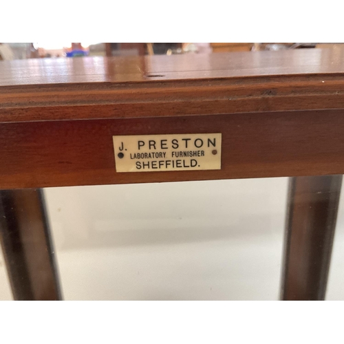1251 - A Victorian pharmaceutical glass cabinet for scales with a sliding panel. Labelled J Preston, Labora... 