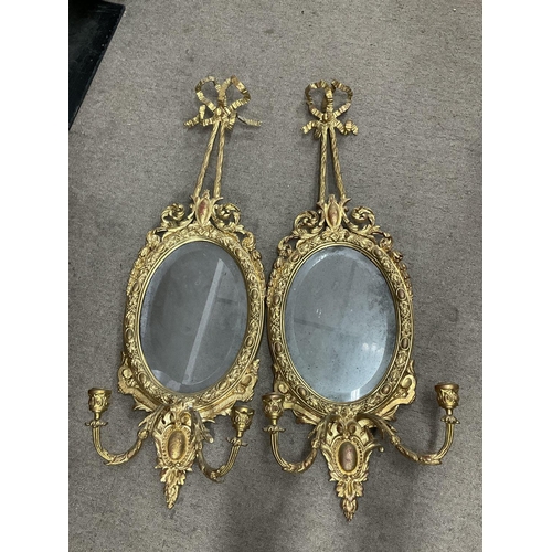 1253 - Two early gilt regency style period mirrors with built in candle sconces.