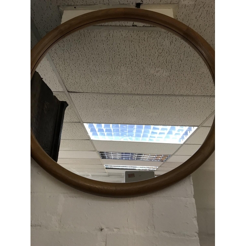 1258 - A Danish circular wall mirror. 60 cm