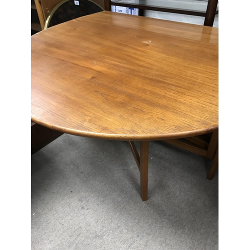 1259 - A Drop leaf table and two chairs .
