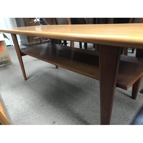 1262 - A Danish style long occasional table with undertier 150 cm by 50 cm