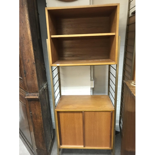 1263 - A ladder back cabinet with open sections and a pair of sliding doors. 160 cm by 60cm