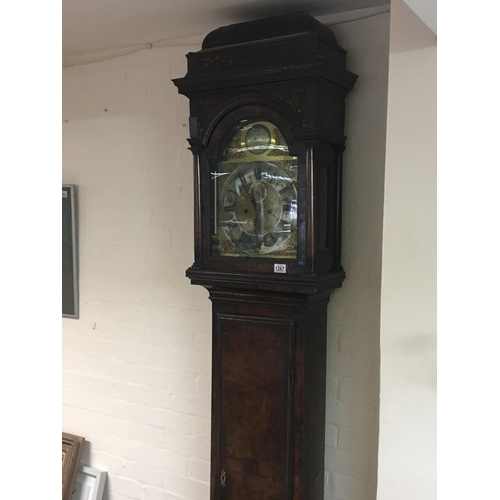 1267 - A George II 18th Century Walnut long case clock with a caddy top and fretwork panels the brass dial ... 
