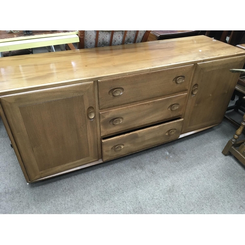 1268 - A Ercole sideboard fitted with three drawers flanked by a pair of cupboard doors
