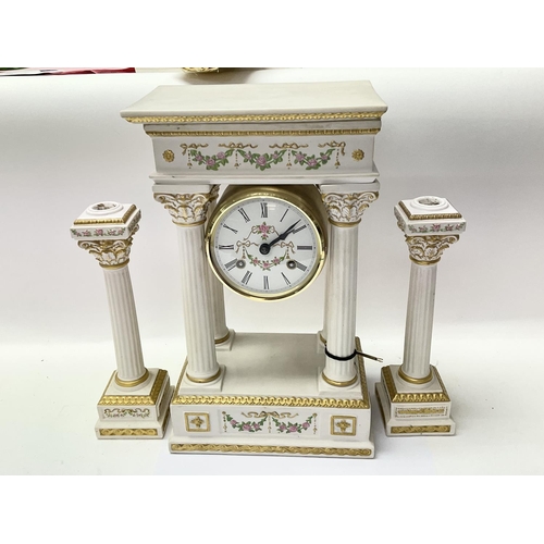 1273 - A white porcelain portico clock empress Josephine Germany hermle, working. There is no winding key. ... 