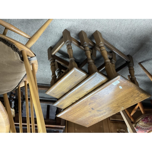 1281 - A nest of 3 solid oak side tables.