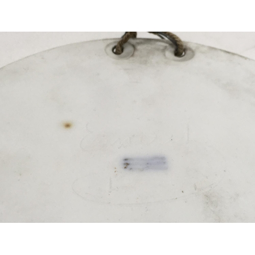 944 - Five Royal Copenhagen circular plaques including a signed Eneret example, approx diameter 14.5c,.