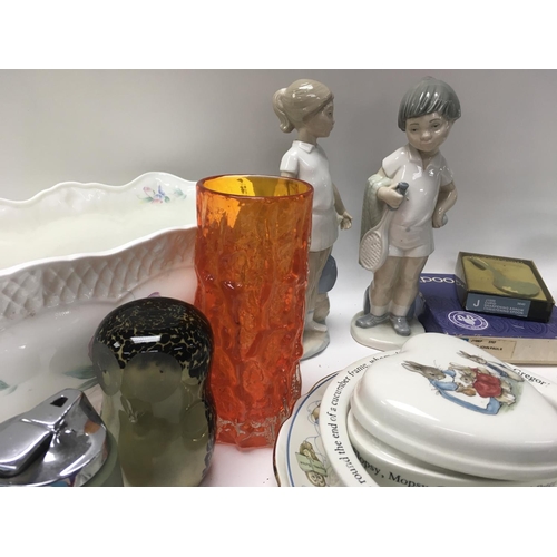 945 - A collection of ceramics including Wedgwood together with a whitefriars vase and an owl paperweight.