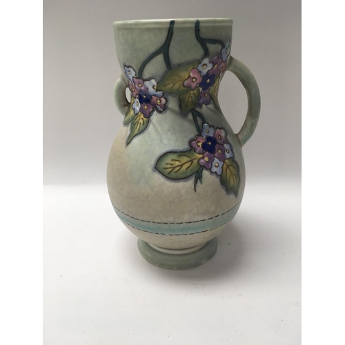 956 - A crown Devon Fieldings vase decorated with flowers and foliage.