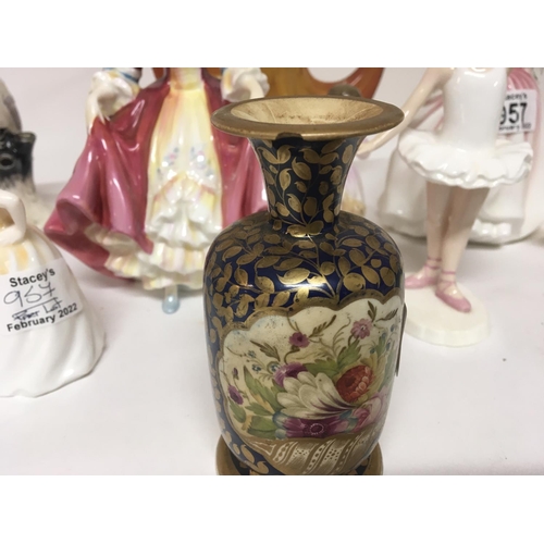 957 - A collection of Royal Doulton figures NAO A Victorian hand painted vase (slight damage) and a Vintag... 