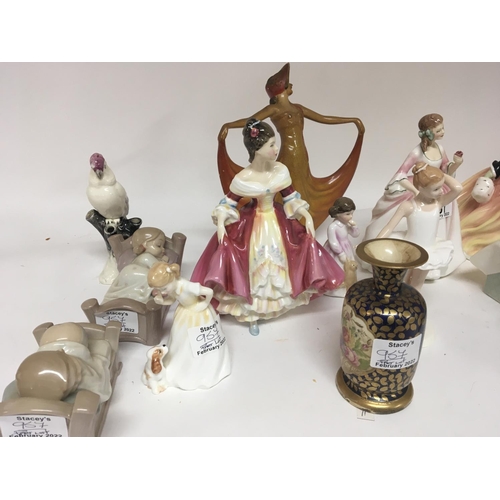 957 - A collection of Royal Doulton figures NAO A Victorian hand painted vase (slight damage) and a Vintag... 
