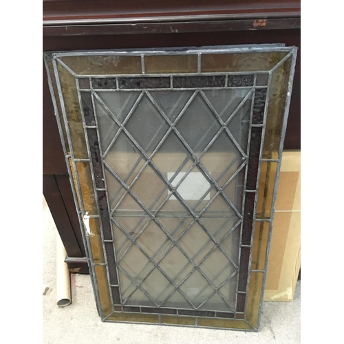 959 - Two stained glass Windows, measuring approximately 86cm x 108cm.