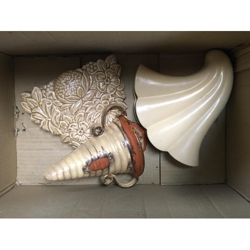 960 - A Collection of ceramic wall pockets and a copper bucket.