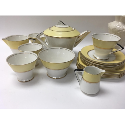 969 - A part Art Deco paslissy tea set a pair of Belleek vases and Art nouveau style pottery dish .