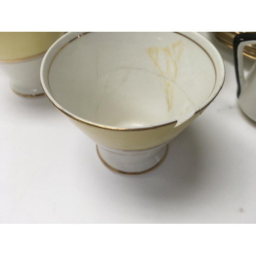 969 - A part Art Deco paslissy tea set a pair of Belleek vases and Art nouveau style pottery dish .