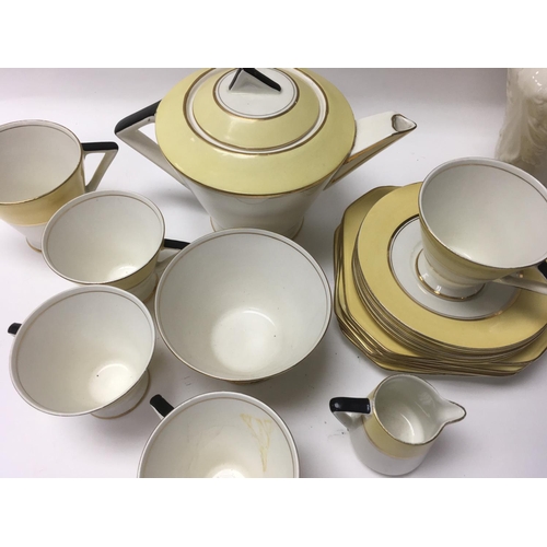 969 - A part Art Deco paslissy tea set a pair of Belleek vases and Art nouveau style pottery dish .