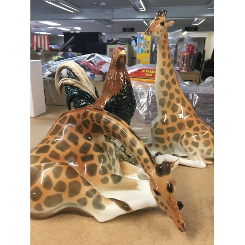 971 - A Beswick cocktail and two Russian porcelain giraffes .