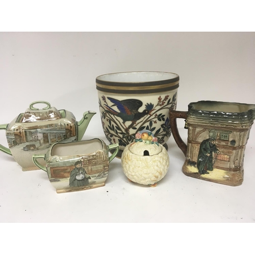 980 - A Royal Doulton tea pot and conforming sugar bow Clarice Cliff preserve pot a Doulton Oliver Twist J... 