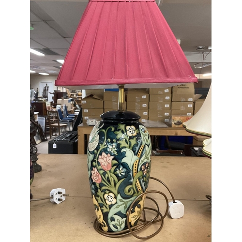 985 - A Moorcroft Golden Lily lamp and shade.