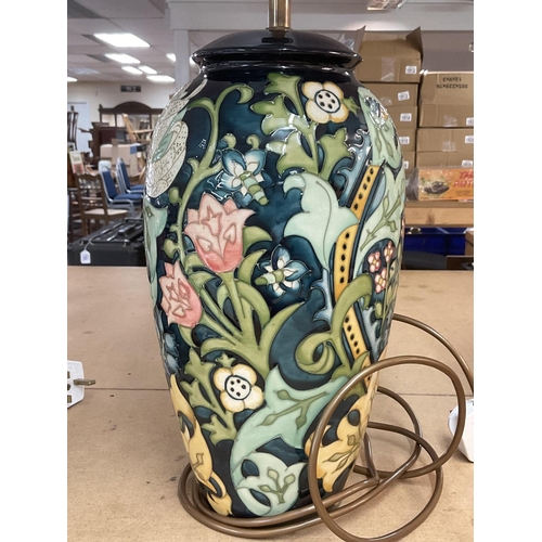 985 - A Moorcroft Golden Lily lamp and shade.