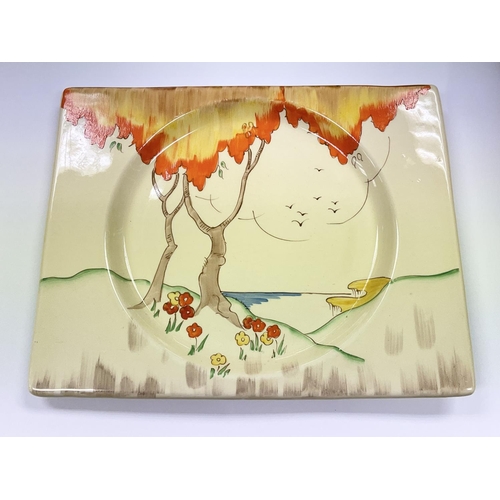 988 - A Clarice Cliff orange taormina plate.